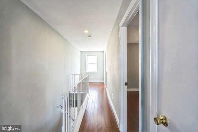 hallway featuring dark hardwood / wood-style floors