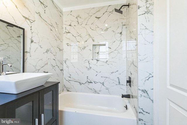 bathroom with vanity and shower / tub combination