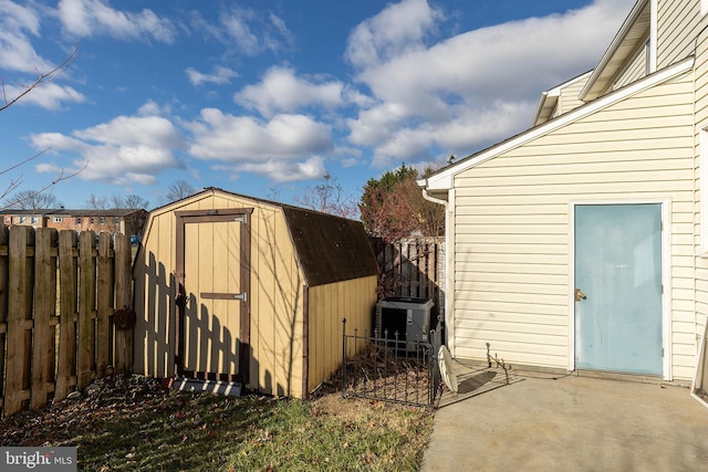 view of outdoor structure featuring central AC unit