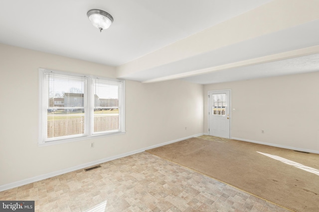 view of carpeted spare room