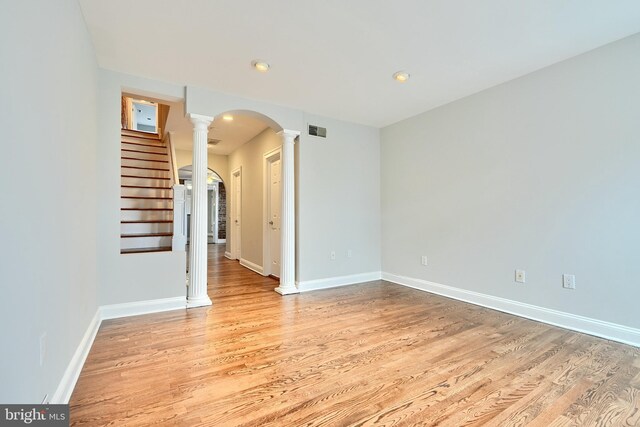 unfurnished room with light wood-type flooring