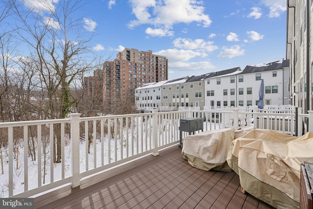 view of snow covered deck