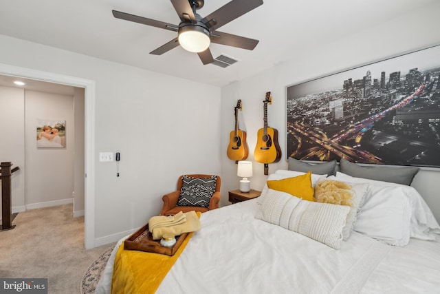 bedroom with ceiling fan and carpet