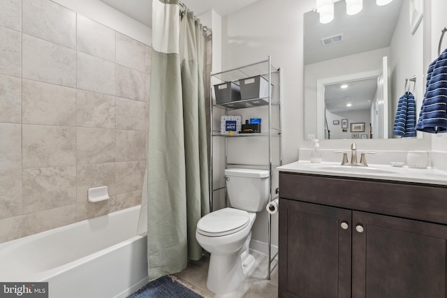 full bathroom with vanity, toilet, and shower / tub combo with curtain