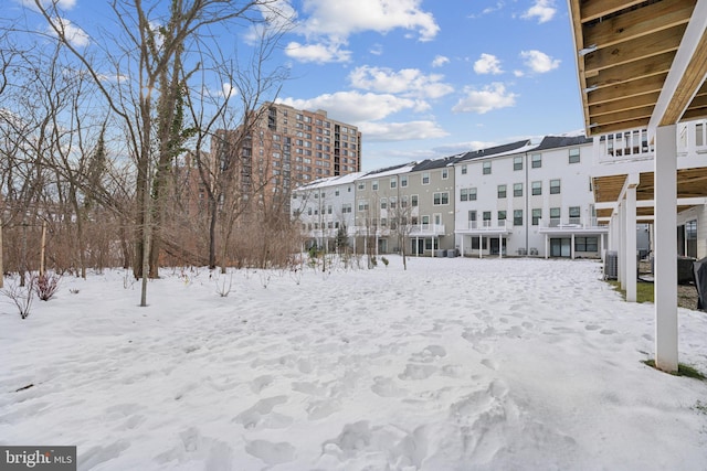 view of snow covered property