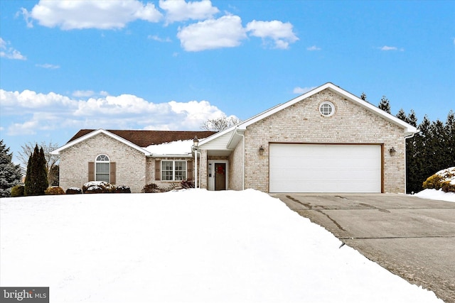 ranch-style house featuring a garage