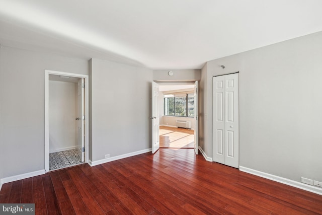 empty room featuring hardwood / wood-style flooring