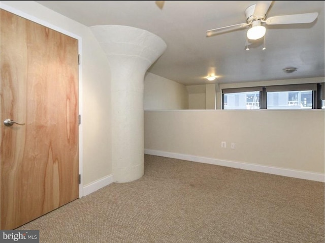 bonus room featuring carpet flooring and ceiling fan