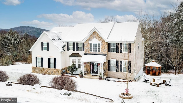 view of front of house featuring a mountain view