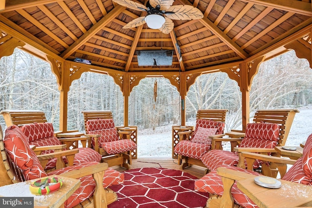 snow covered patio with a gazebo