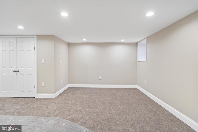 basement featuring carpet