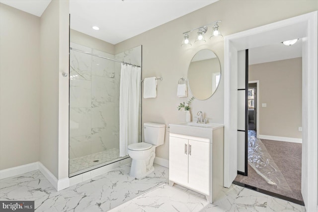 bathroom featuring toilet, vanity, and a shower with curtain