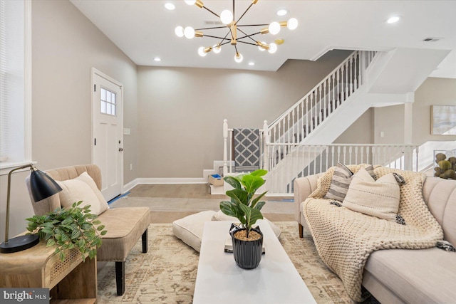 living room with a notable chandelier