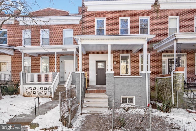 multi unit property featuring a porch