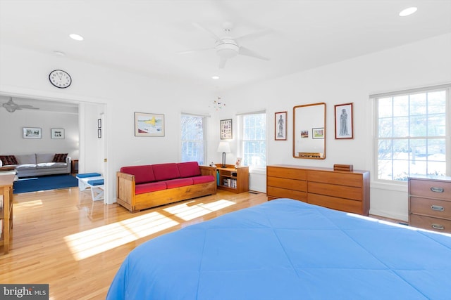 bedroom featuring light hardwood / wood-style flooring and ceiling fan