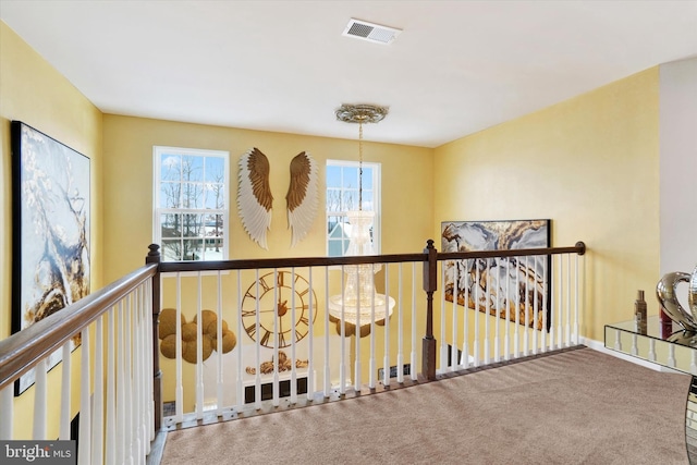 hallway with carpet flooring