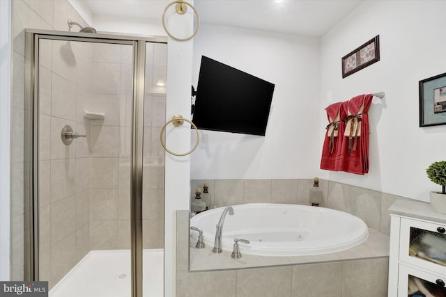 bathroom featuring plus walk in shower