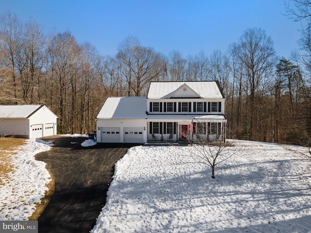 front of property featuring a garage