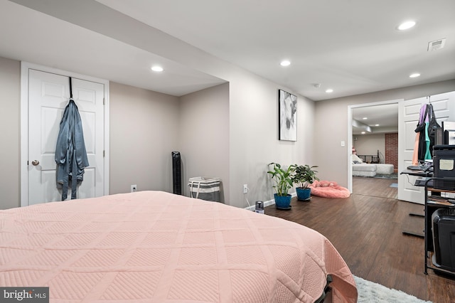 bedroom featuring hardwood / wood-style floors