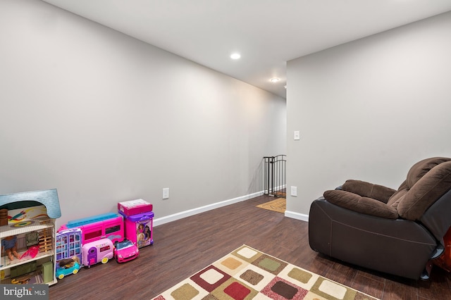 living area featuring dark hardwood / wood-style flooring