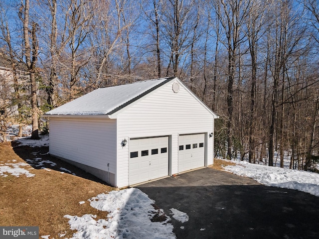 view of snow covered garage