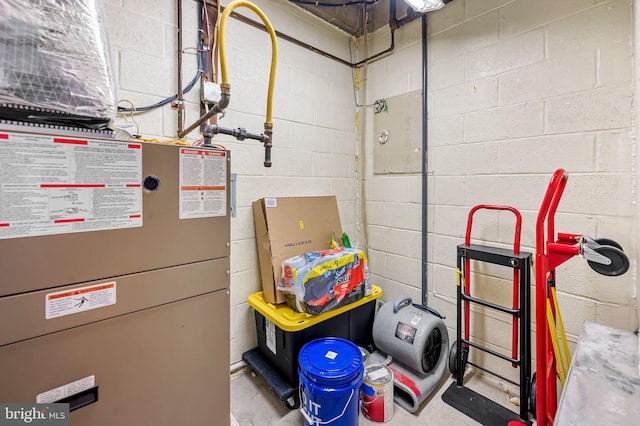 utility room with heating unit