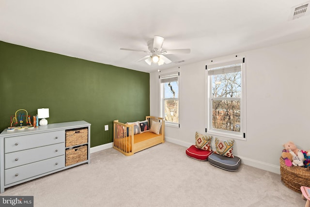 playroom featuring ceiling fan and light colored carpet