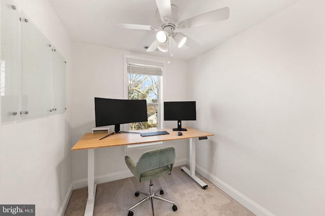 office featuring light colored carpet and ceiling fan