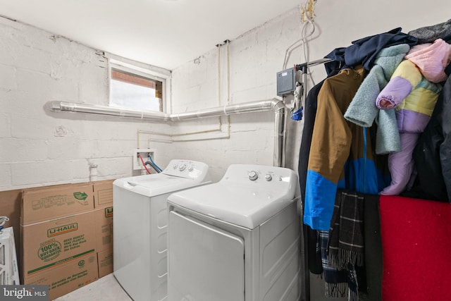 laundry area with washing machine and dryer