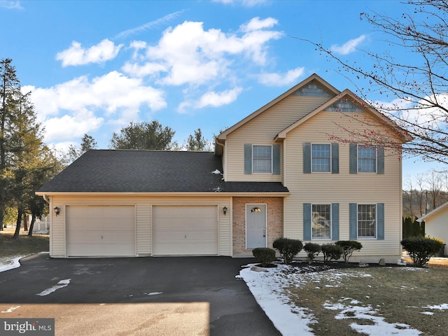 front facade with a garage