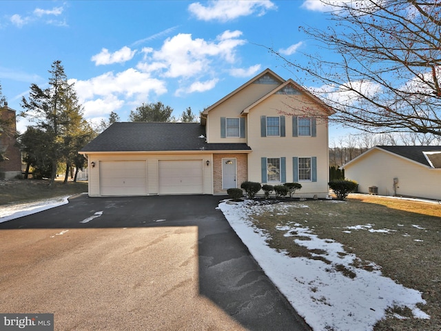 view of front property with a garage