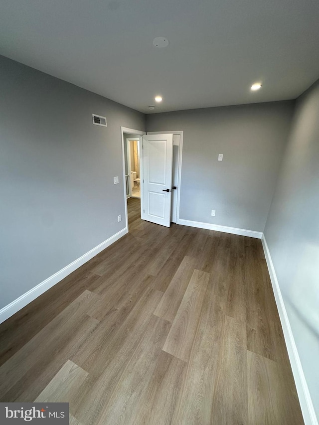 unfurnished room featuring light wood-type flooring