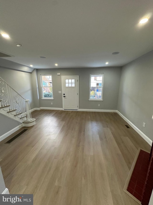 entryway featuring a healthy amount of sunlight and light wood-type flooring