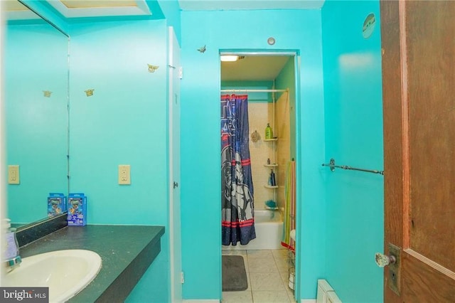 bathroom featuring shower / bath combo, vanity, and tile patterned floors