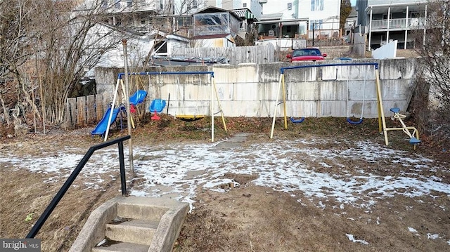 view of snow covered playground