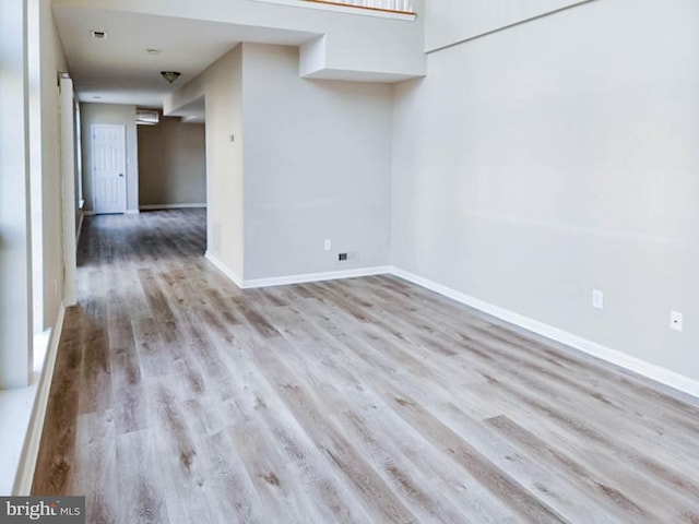 empty room with light wood-type flooring