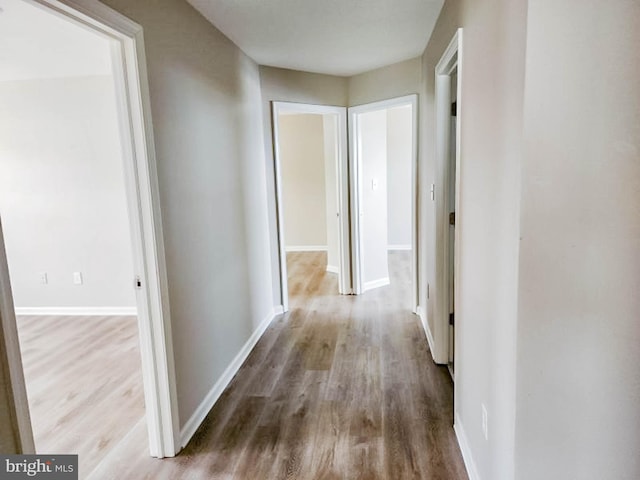 hall with light wood-type flooring