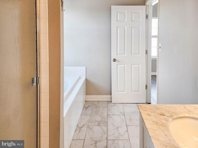 bathroom featuring vanity and independent shower and bath