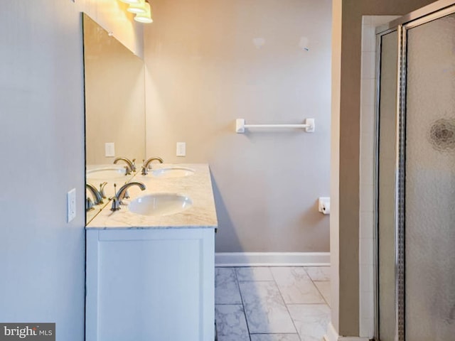 bathroom with vanity and an enclosed shower