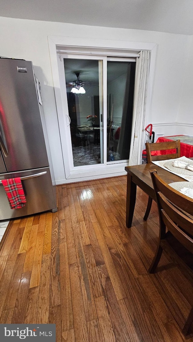 dining room featuring hardwood / wood-style flooring and ceiling fan