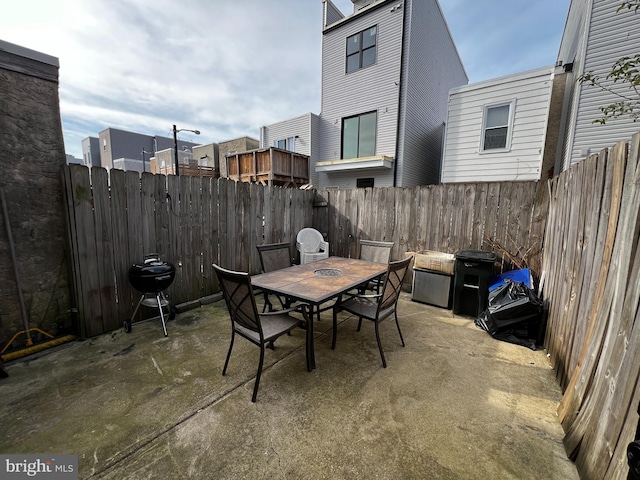 view of patio with a grill