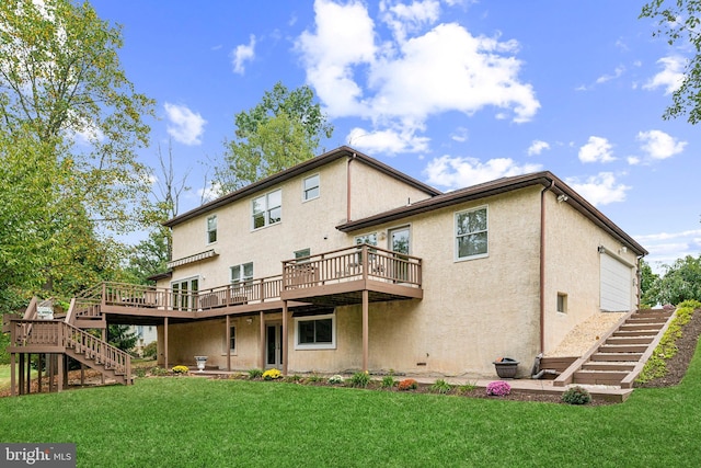 back of property with a lawn and a wooden deck