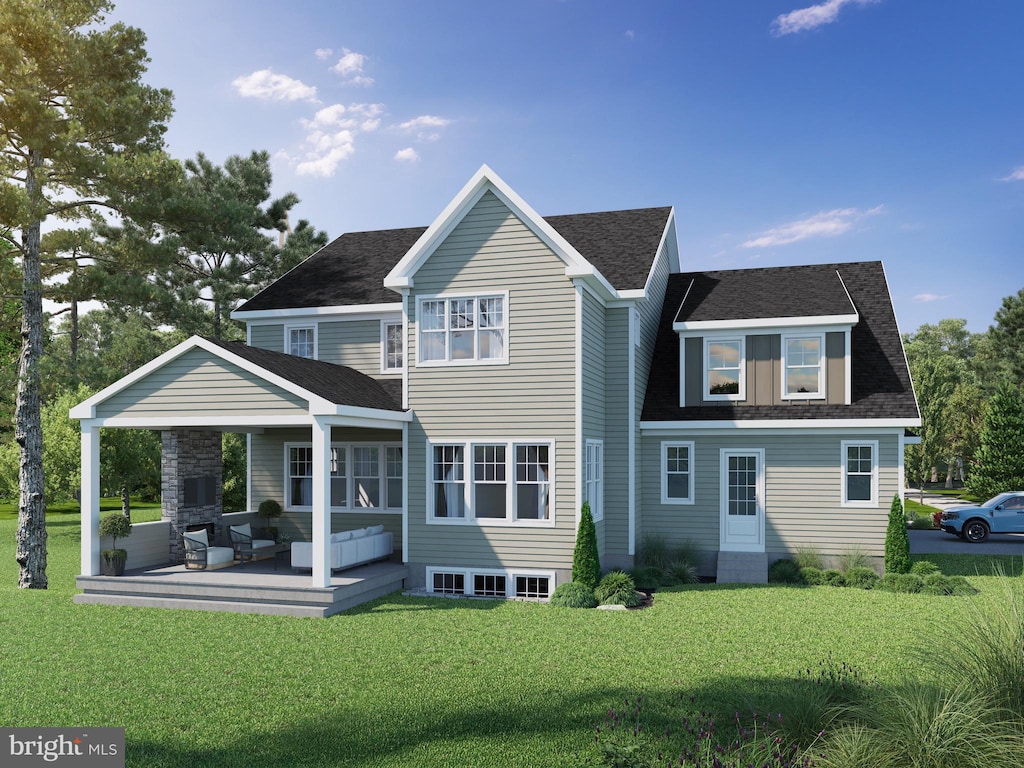 back of house with a wooden deck, a lawn, and roof with shingles