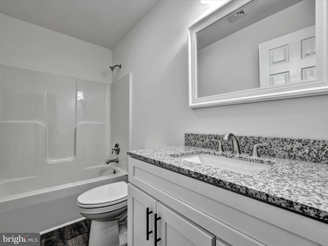 full bathroom featuring shower / tub combination, vanity, wood-type flooring, and toilet