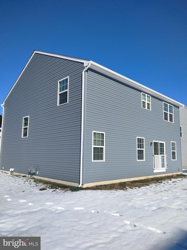 view of snow covered property