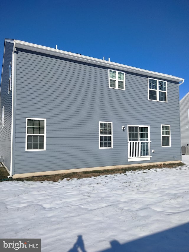 view of snow covered house