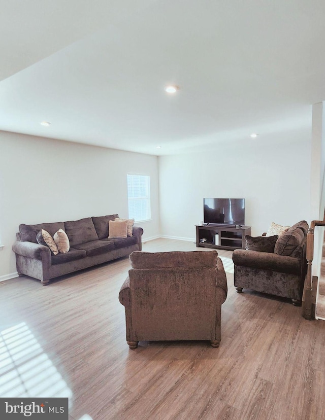 living room with light hardwood / wood-style floors