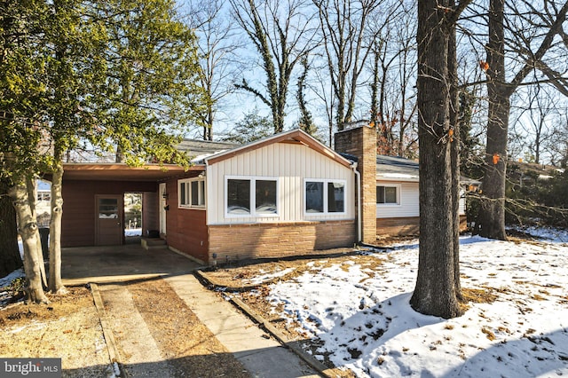 exterior space with a carport