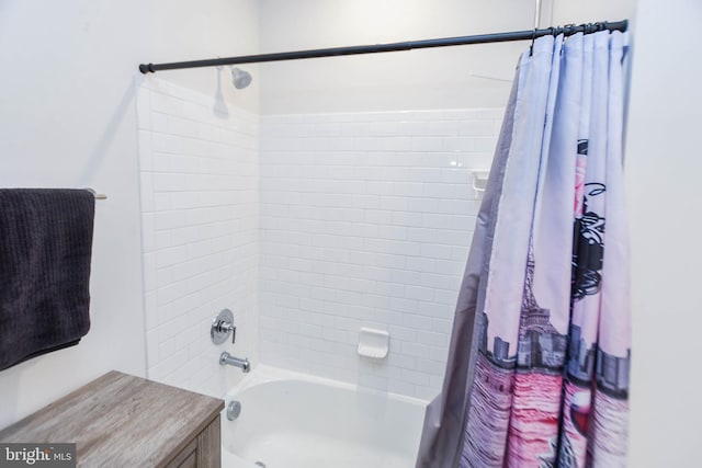 bathroom featuring shower / bathtub combination with curtain