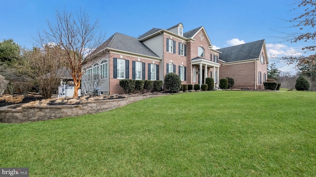 view of front facade with a front lawn